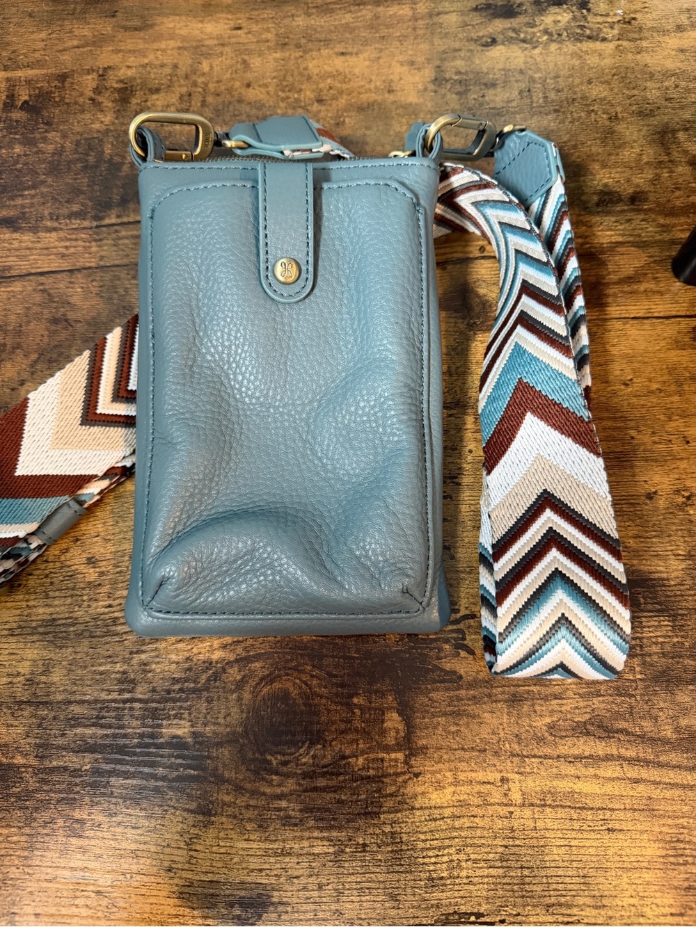 Hobo Blue Leather Crossbody Phone Bag with Patterned Strap